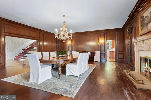 a view of a balcony with two chairs and a table