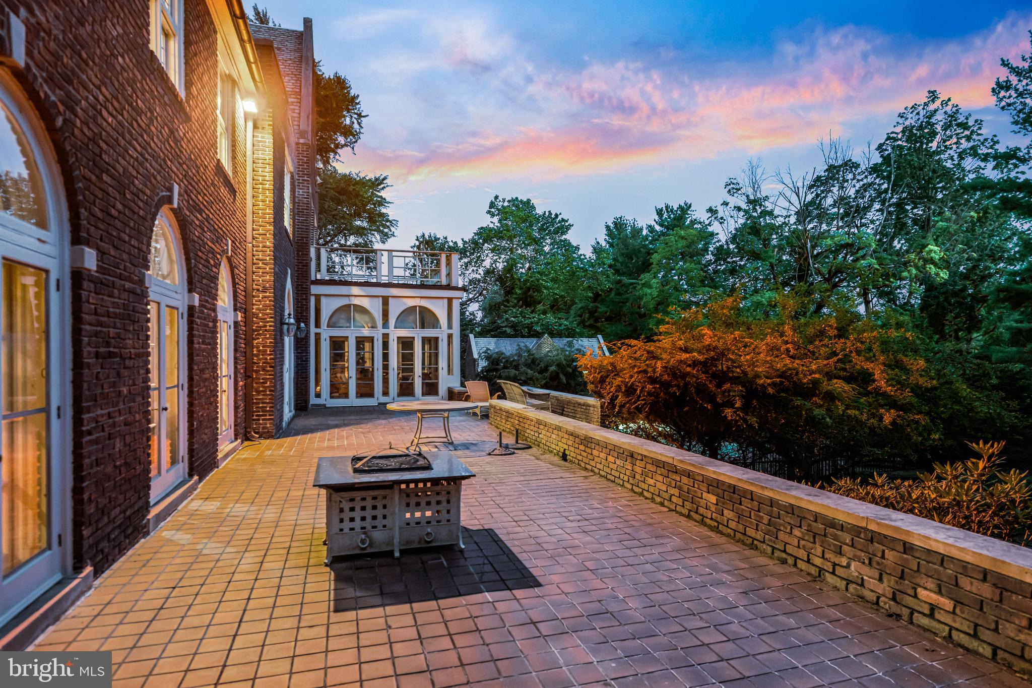 717 North Spring Mill Road Villanova, PA 19085 - Photo 18 of 62 a view of a balcony with two chairs and a table