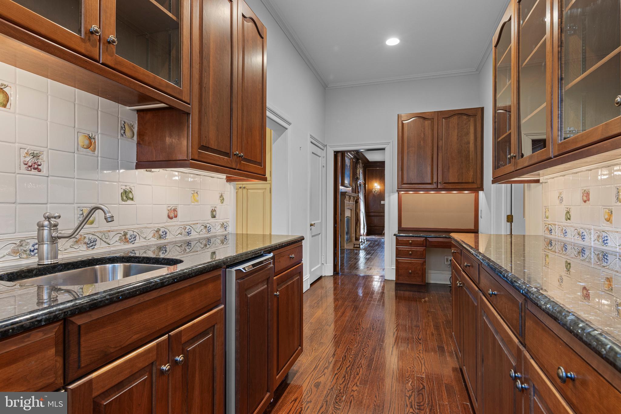 717 North Spring Mill Road Villanova, PA 19085 - Photo 19 of 62 a kitchen with stainless steel appliances granite countertop a sink stove and refrigerator
