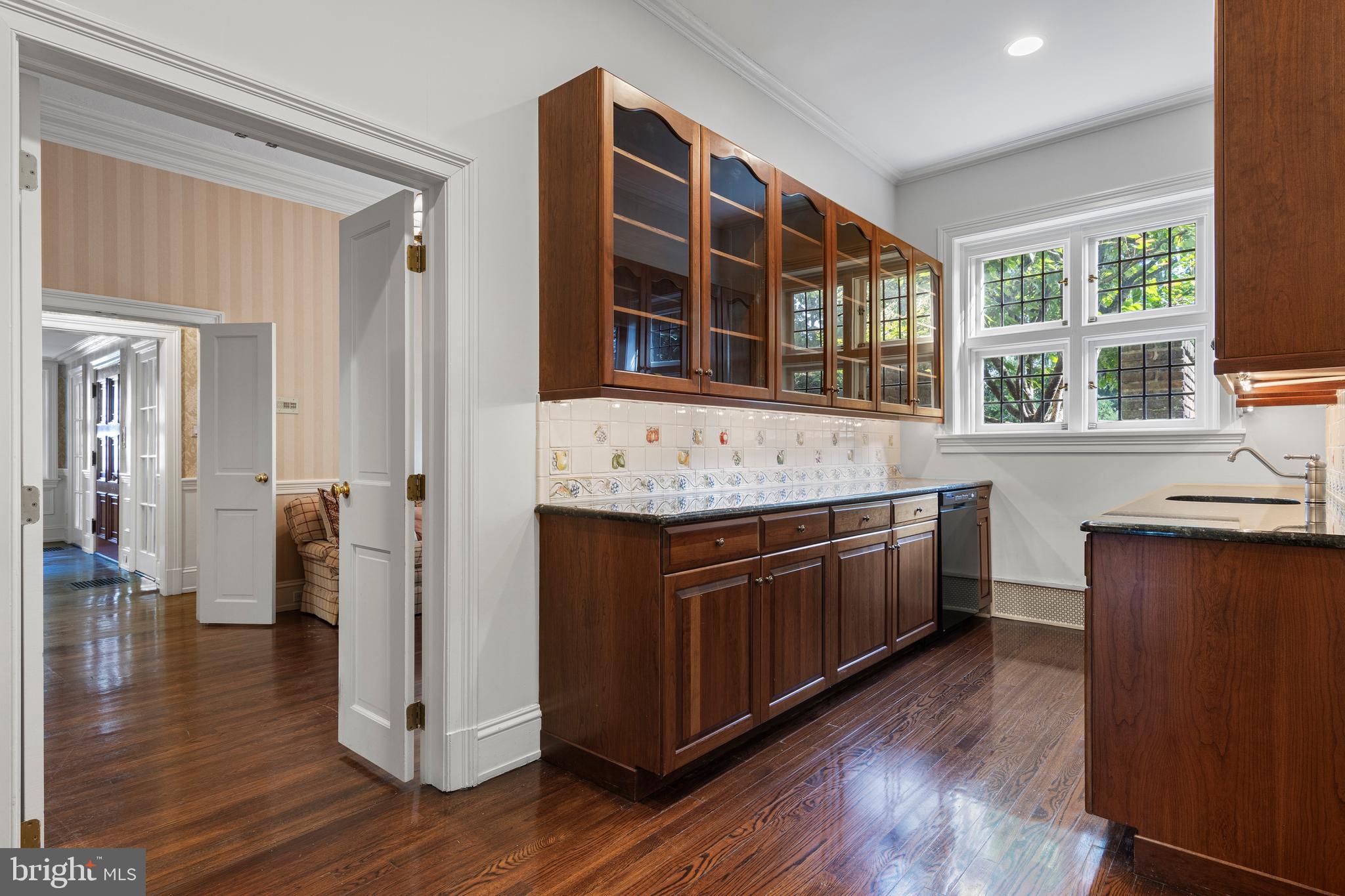 717 North Spring Mill Road Villanova, PA 19085 - Photo 20 of 62 a kitchen with stainless steel appliances granite countertop a stove and cabinets