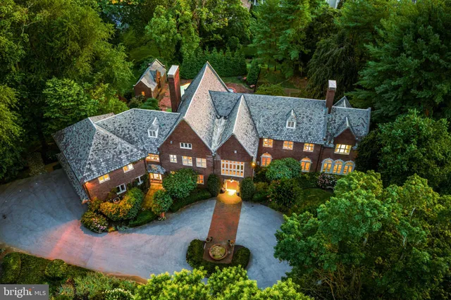 an aerial view of a house with a garden
