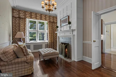 a large kitchen with stainless steel appliances granite countertop a stove a sink and a refrigerator