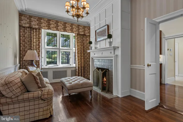 a large kitchen with stainless steel appliances granite countertop a stove a sink and a refrigerator