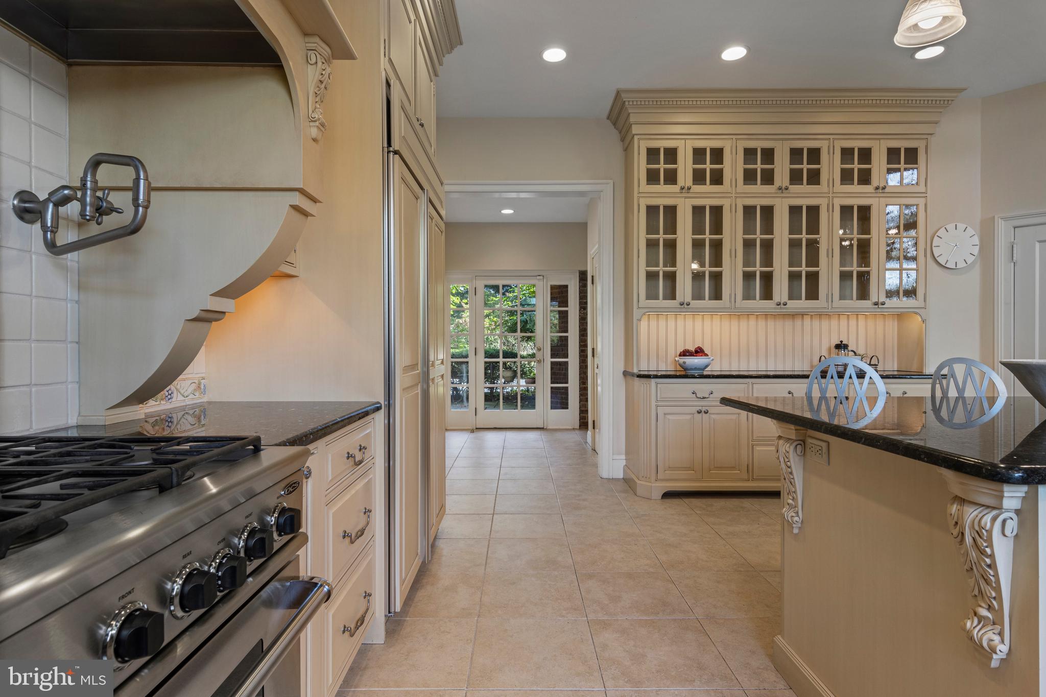 717 North Spring Mill Road Villanova, PA 19085 - Photo 25 of 62 a kitchen with a stove and a sink