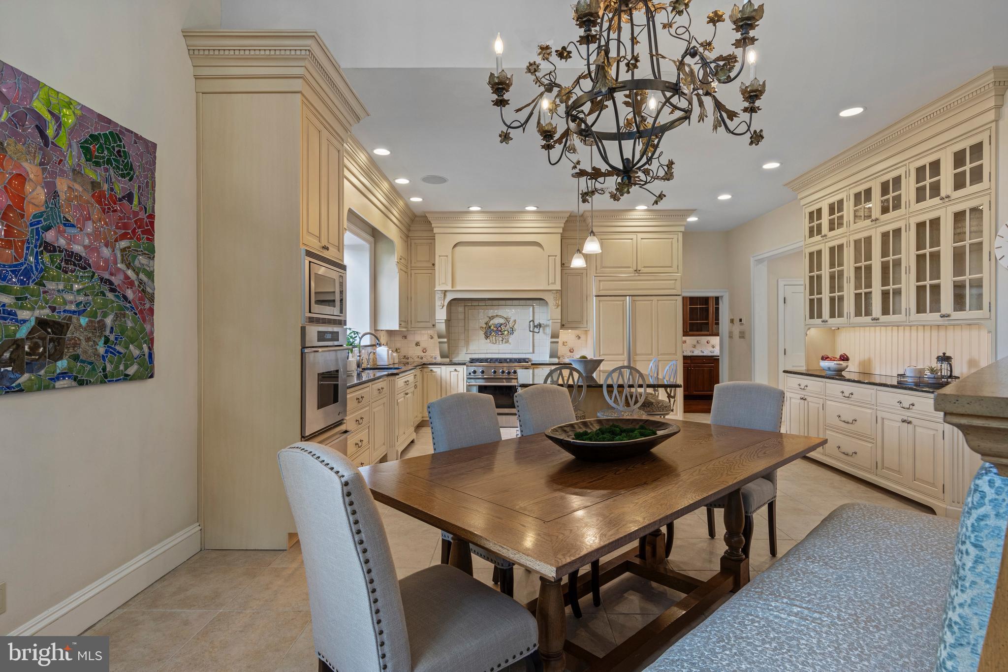 717 North Spring Mill Road Villanova, PA 19085 - Photo 27 of 62 a view of a dining room with furniture and chandelier