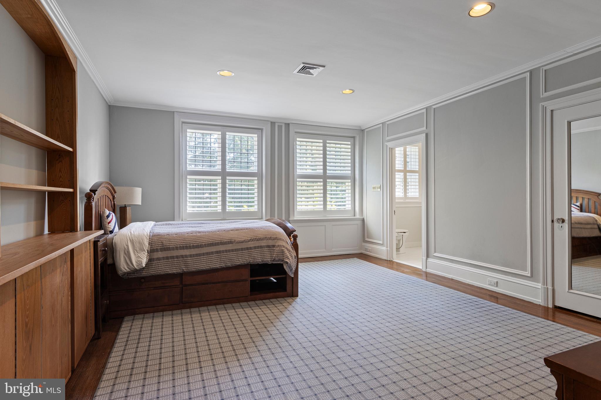717 North Spring Mill Road Villanova, PA 19085 - Photo 47 of 62 a spacious bedroom with a bed and a window