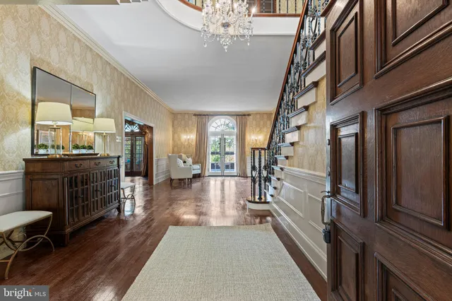 a view of entryway with wooden floor