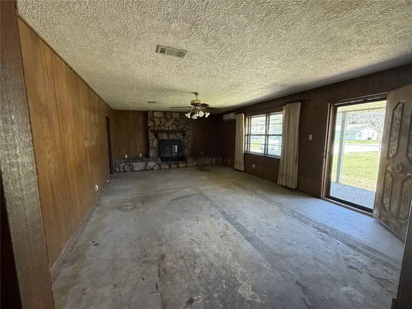 an empty room with windows