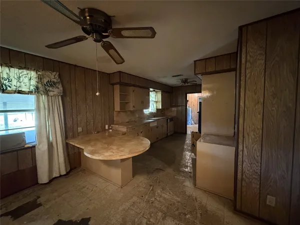 a bathroom with a sink a toilet and a shower