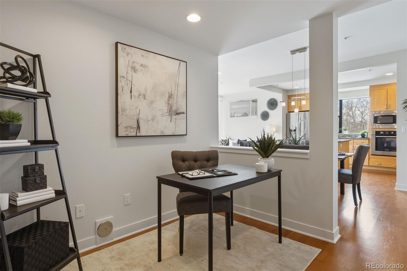 360 South Lafayette Street, Unit 301 Denver, CO 80209 - Photo 14 of 29 a view of a workspace with furniture