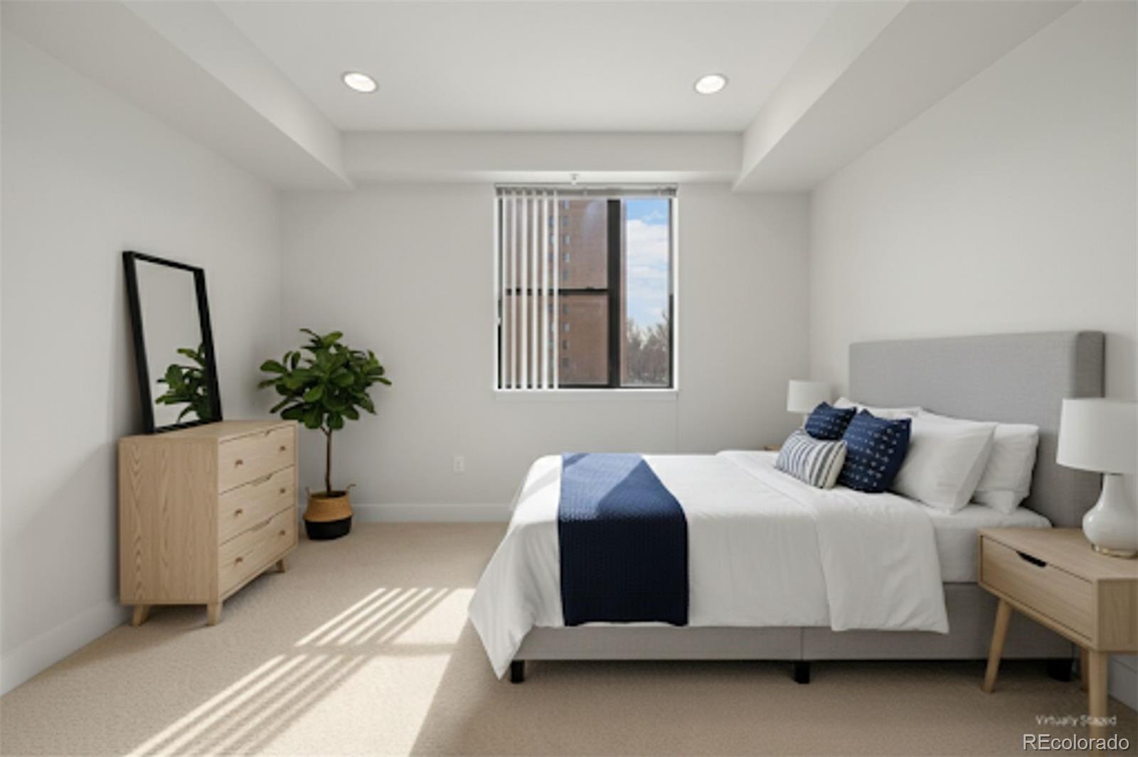 360 South Lafayette Street, Unit 301 Denver, CO 80209 - Photo 15 of 29 a bedroom with a bed and a dresser