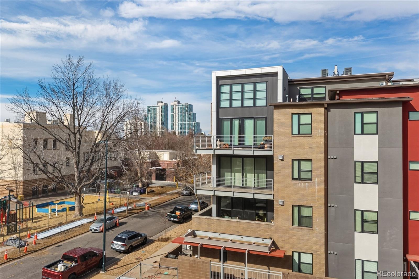 360 South Lafayette Street, Unit 301 Denver, CO 80209 - Photo 2 of 29 a view of a building with many windows