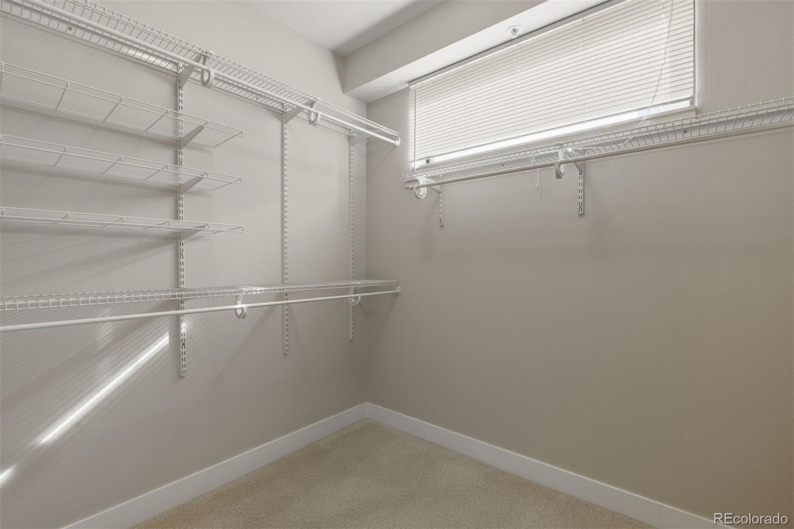 360 South Lafayette Street, Unit 301 Denver, CO 80209 - Photo 22 of 29 a view of a room with racks on the wall