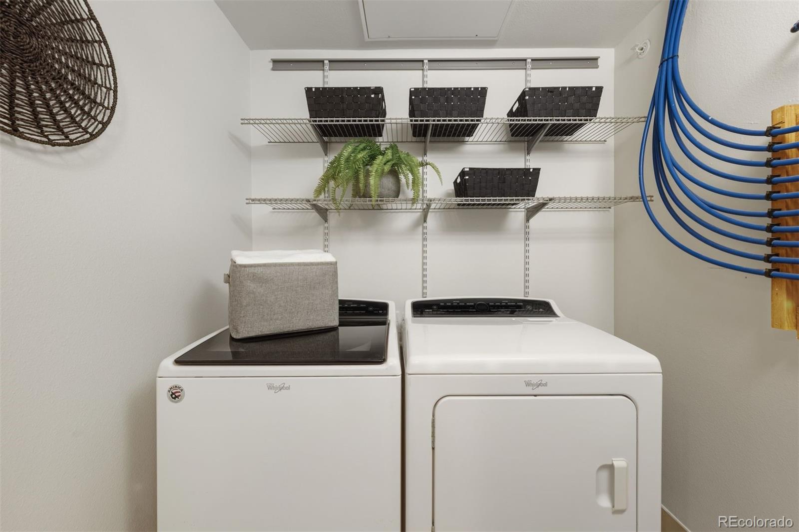 360 South Lafayette Street, Unit 301 Denver, CO 80209 - Photo 24 of 29 a view of washer and dryer