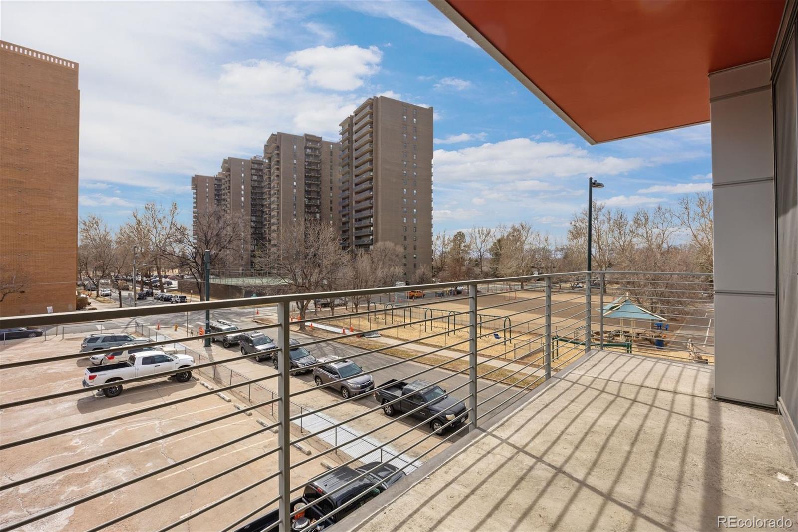 360 South Lafayette Street, Unit 301 Denver, CO 80209 - Photo 27 of 29 a view of roof deck with a barbeque and wooden floor