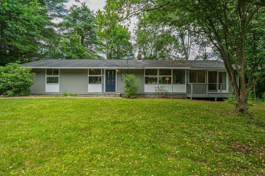 7 Turning Mill Road Lexington, MA 02420 - Photo 1 of 18 a front view of house with yard and green space