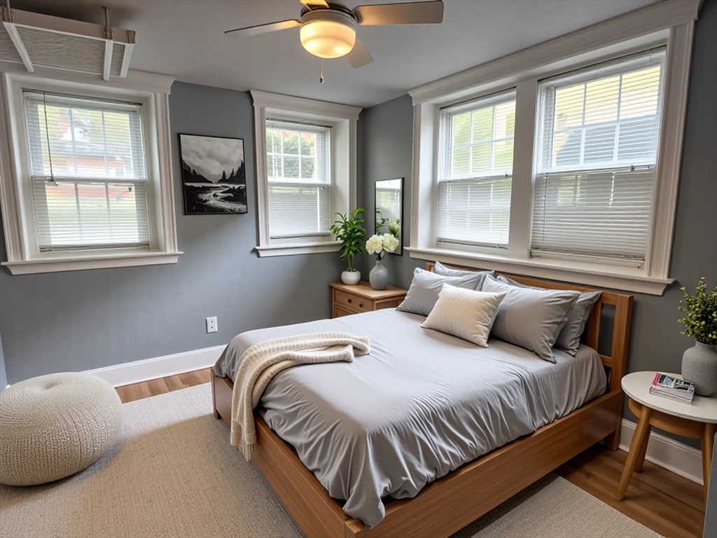 36 St Paul Street, Unit B Brookline, MA 02446 - Photo 5 of 6 a bedroom with a bed and window