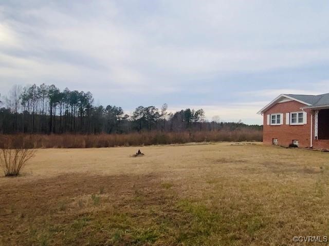 5939 Dry Bread Road Emporia, VA 23847 - Photo 15 of 22 a view of a lake in middle of forest