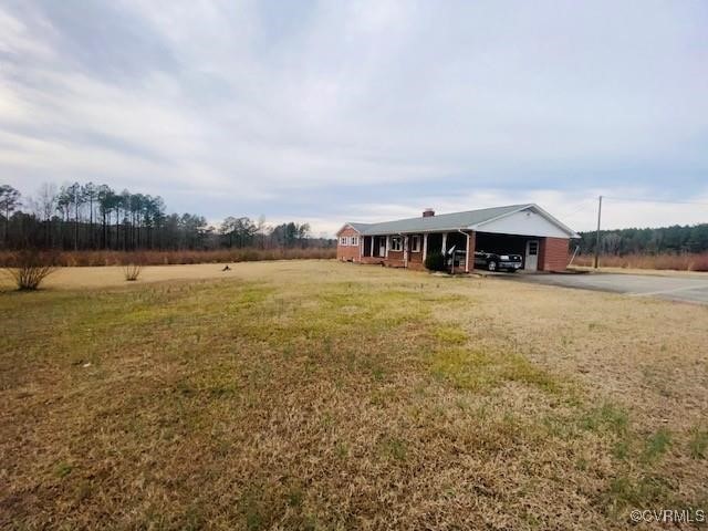 5939 Dry Bread Road Emporia, VA 23847 - Photo 19 of 22 a view of house with outdoor space and seating area