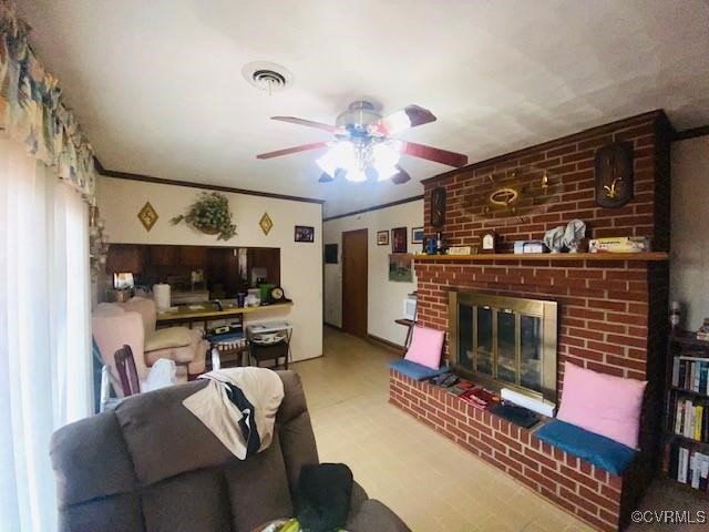 5939 Dry Bread Road Emporia, VA 23847 - Photo 2 of 22 a living room with furniture a flat screen tv and a fireplace