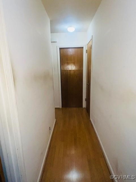 5939 Dry Bread Road Emporia, VA 23847 - Photo 8 of 22 a view of a hallway with wooden floor