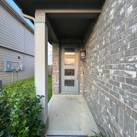 a view of a porch of a house