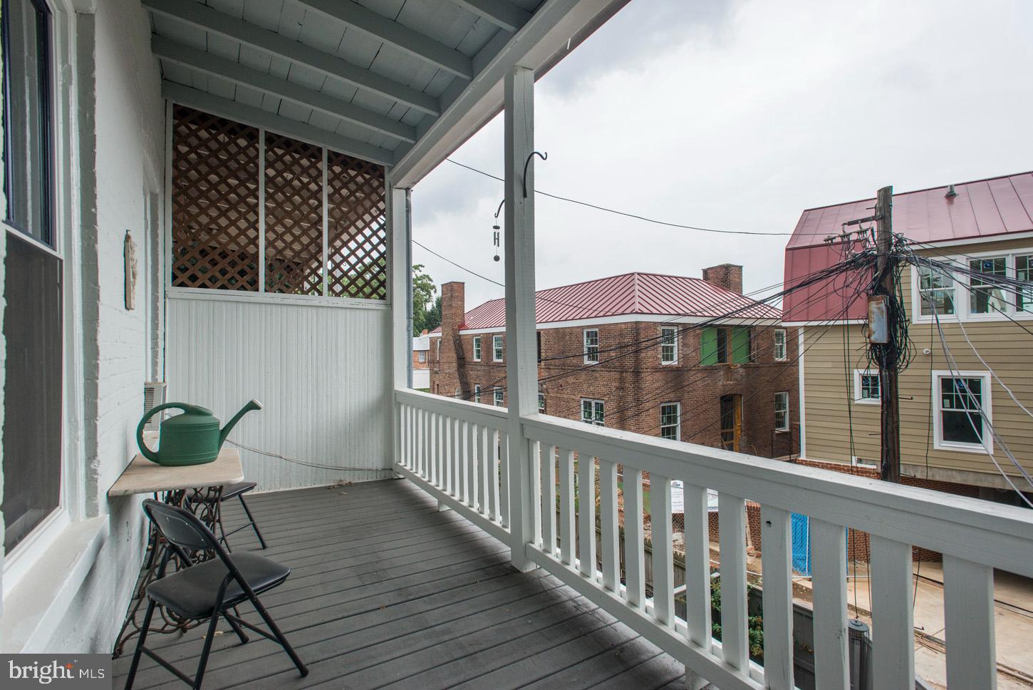 408 6th Street Southeast, Unit 3 Washington, DC 20003 - Photo 12 of 13 a view of a chair and tables in the balcony