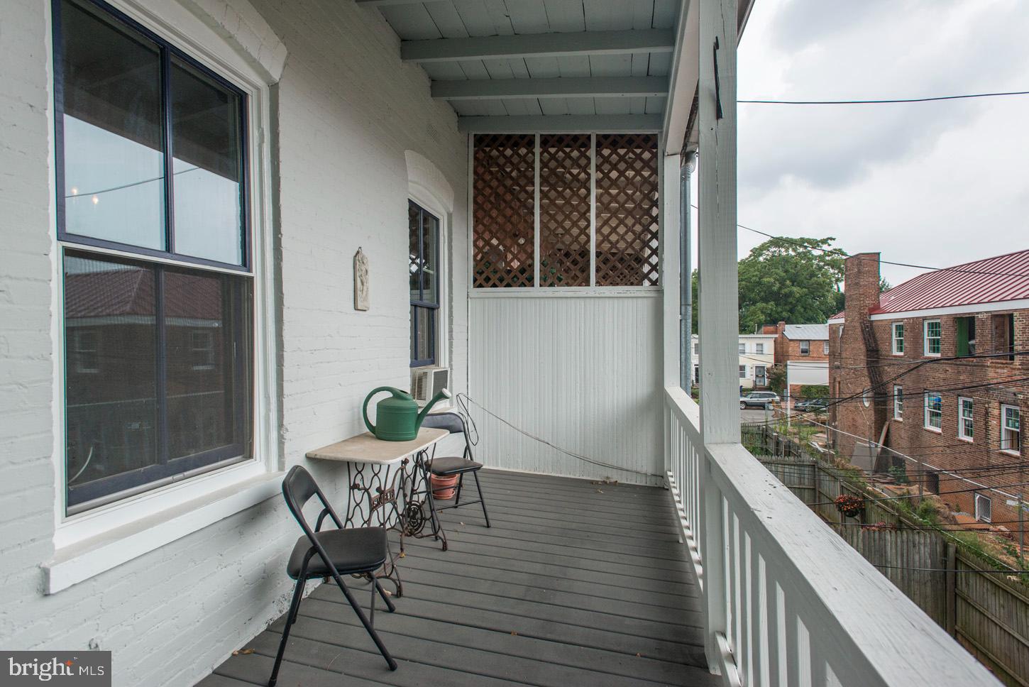 408 6th Street Southeast, Unit 3 Washington, DC 20003 - Photo 13 of 13 a view of a balcony with chairs