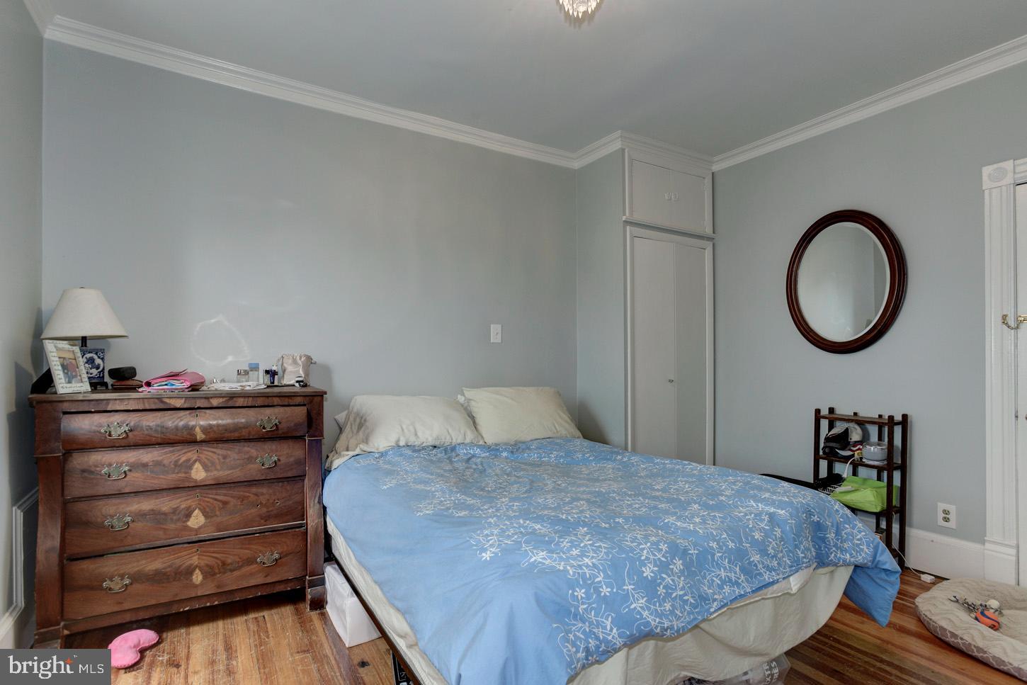 408 6th Street Southeast, Unit 3 Washington, DC 20003 - Photo 10 of 13 a bedroom with a bed and closet
