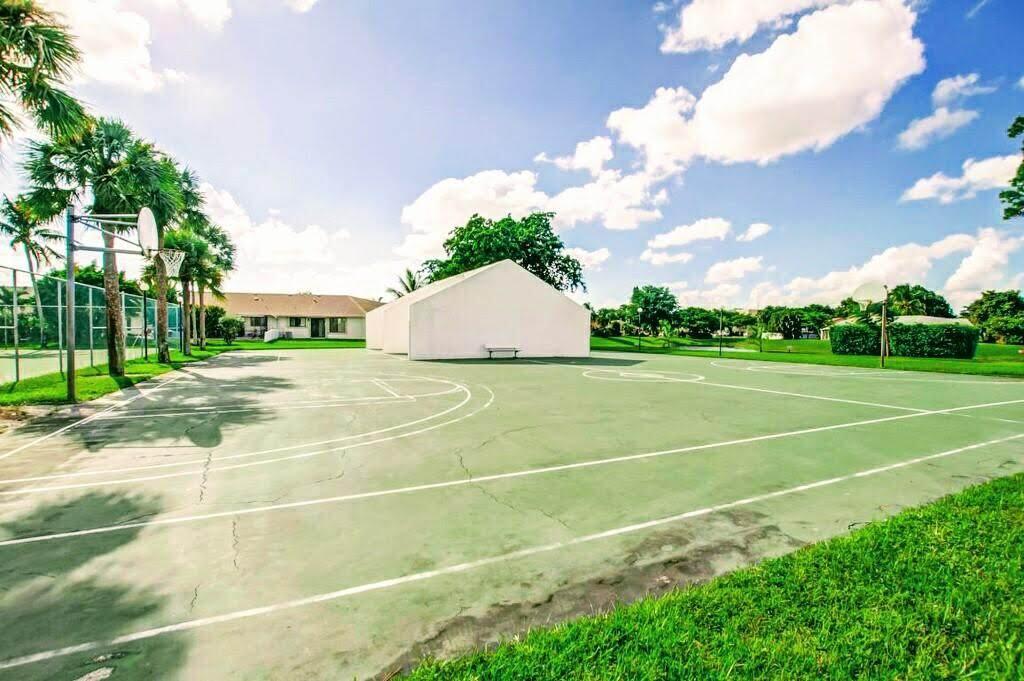 9709 Sunny Isle Circle Boca Raton, FL 33428 - Photo 21 of 21 a view of a tennis court