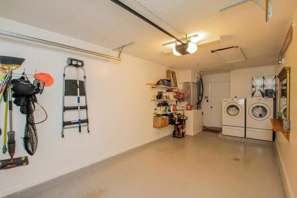 9709 Sunny Isle Circle Boca Raton, FL 33428 - Photo 10 of 21 a view of a room with gym equipment