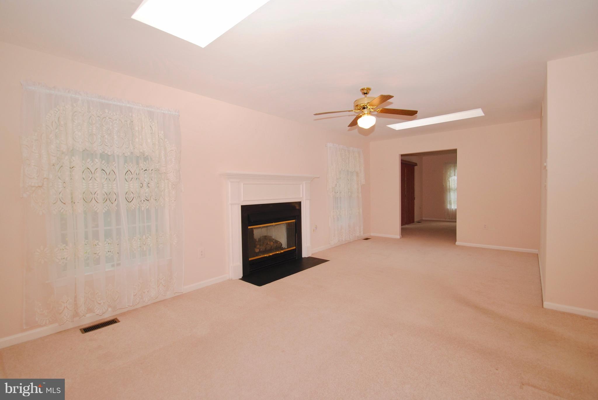 879 Rudder Way Annapolis, MD 21401 - Photo 5 of 29 Family Room with FP & sklylights