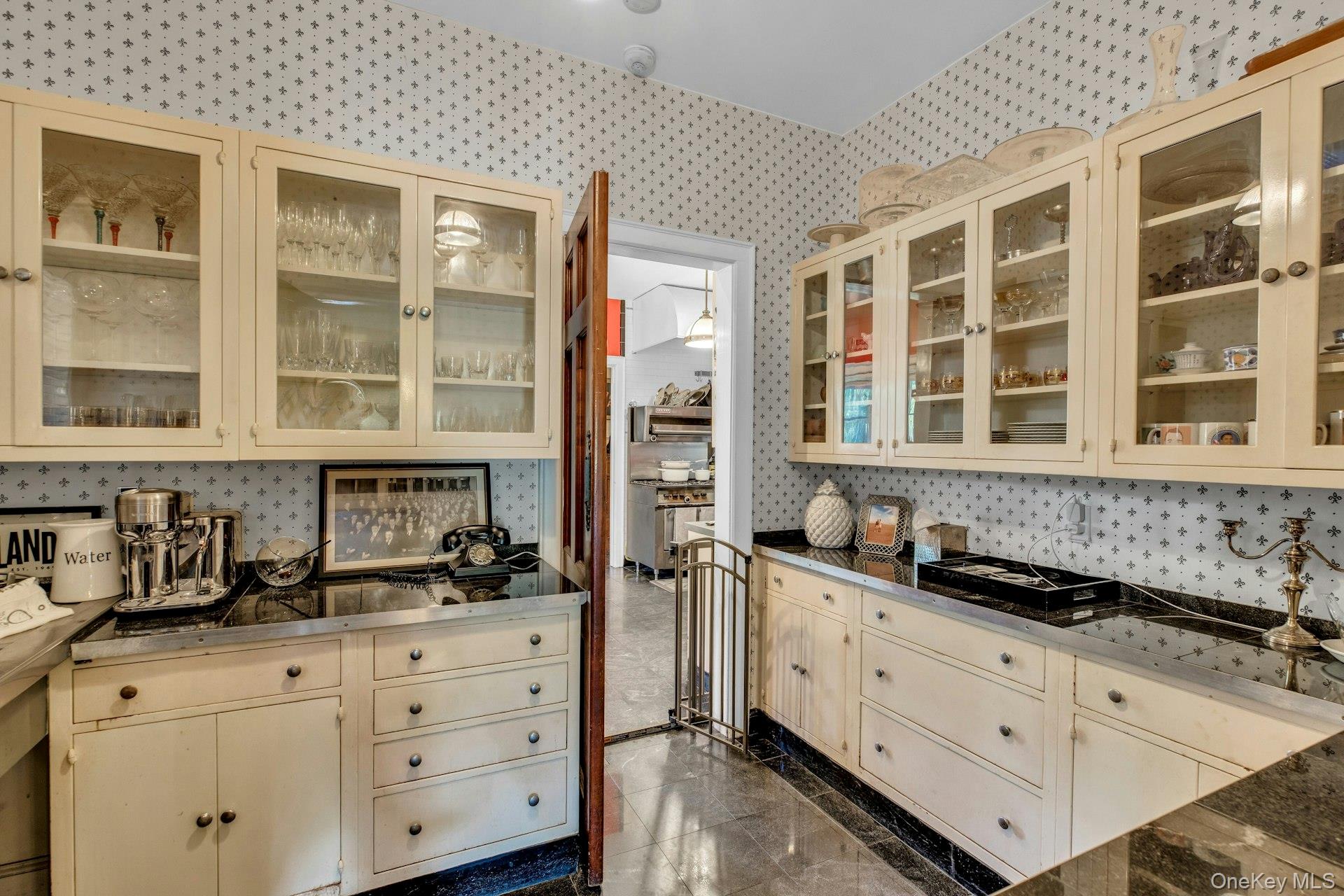 259 Lakeview Avenue West Brightwaters, NY 11718 - Photo 29 of 49 a kitchen with granite countertop a sink and cabinets