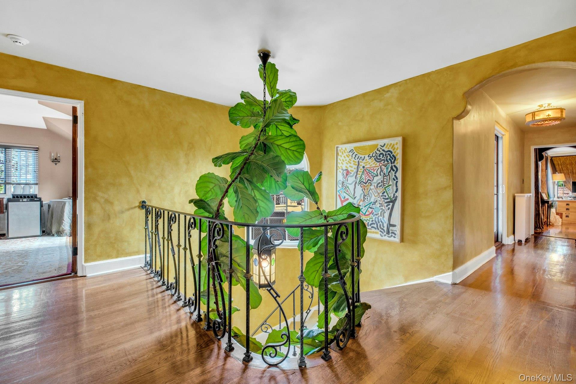 259 Lakeview Avenue West Brightwaters, NY 11718 - Photo 37 of 49 a view of a hallway with wooden floor