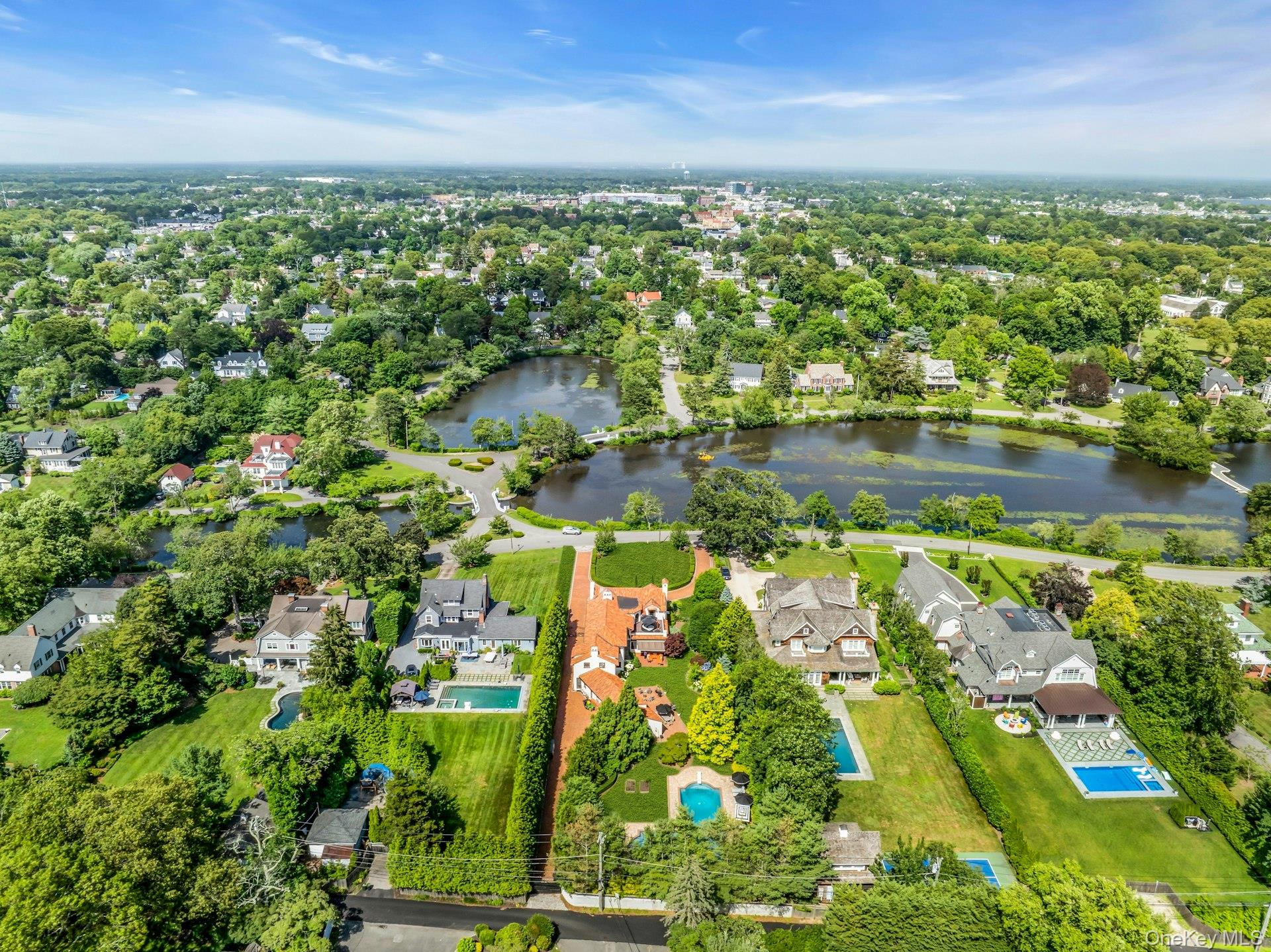 259 Lakeview Avenue West Brightwaters, NY 11718 - Photo 9 of 49 an aerial view of residential houses with outdoor space and lake view