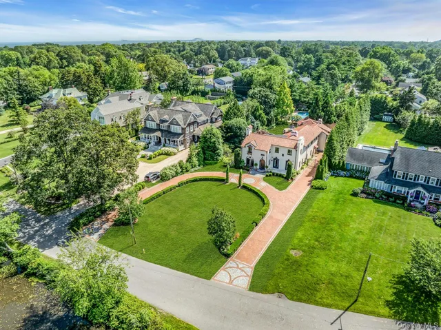 an aerial view of a house with a garden