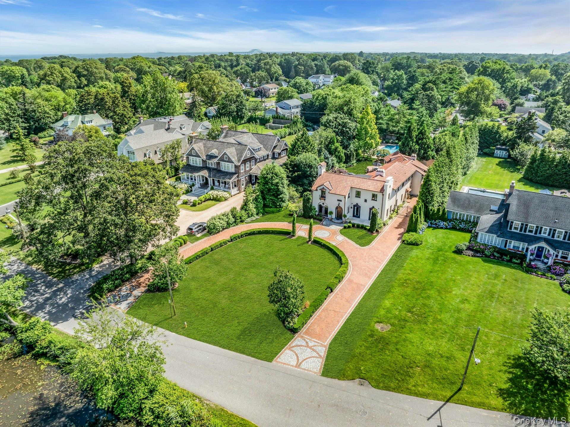 259 Lakeview Avenue West Brightwaters, NY 11718 - Photo 10 of 49 an aerial view of a house with a garden