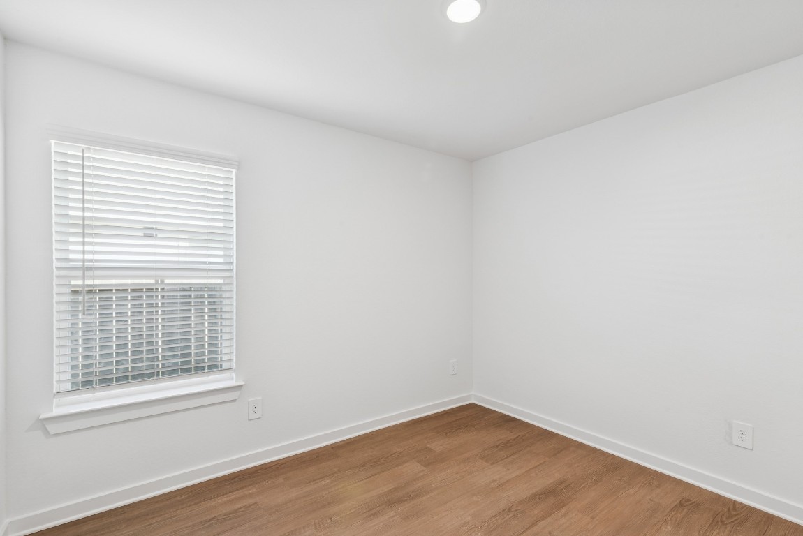 707 Hackberry Branch Magnolia, TX 77354 - Photo 26 of 50 an empty room with a window