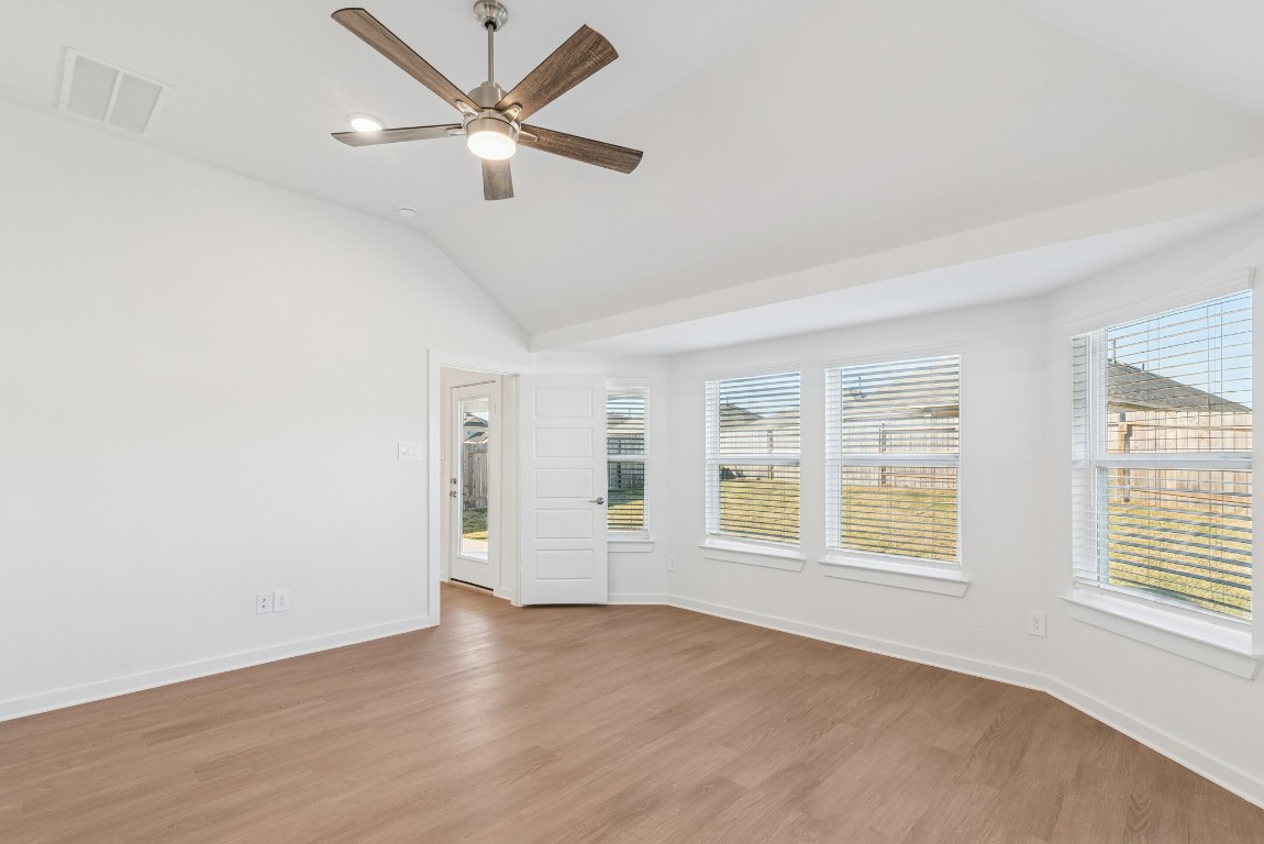707 Hackberry Branch Magnolia, TX 77354 - Photo 36 of 50 wooden floor in an empty room with a window