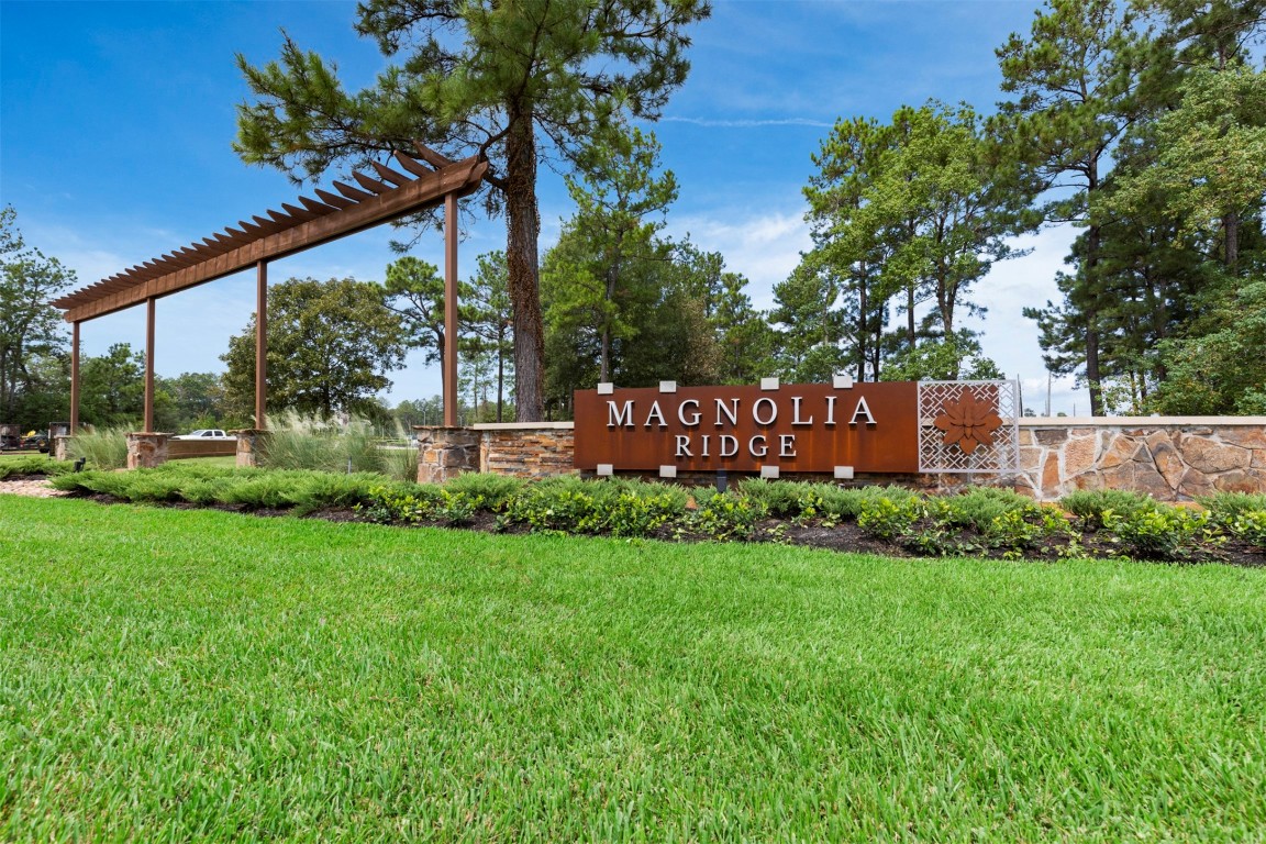 707 Hackberry Branch Magnolia, TX 77354 - Photo 47 of 50 a view of a house with a yard