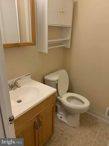 a bathroom with a sink and a toilet