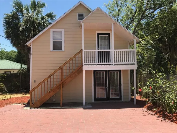 a view of a house with a balcony