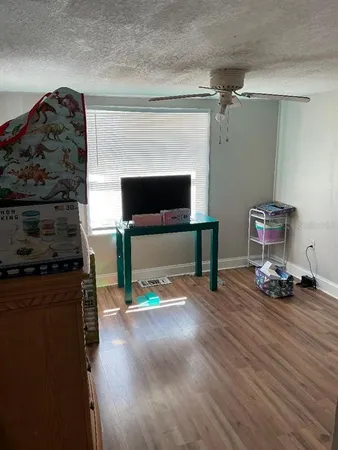 a view of livingroom with furniture and a fireplace