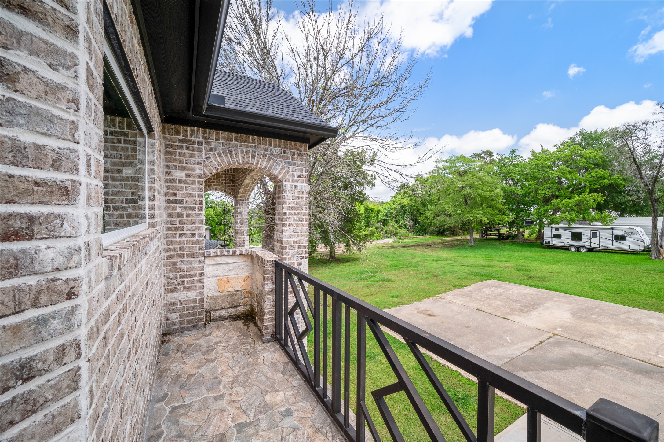 206 Elm Street Highlands, TX 77562 - Photo 47 of 50 Upstairs balcony on front of house that connects to 2 bedrooms