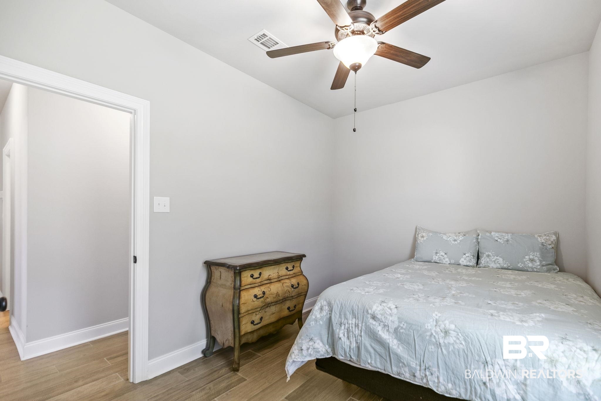 10140 Chipper Lane Foley, AL 36535 - Photo 35 of 72 Bedroom featuring ceiling fan and light hardwood / wood-style floors