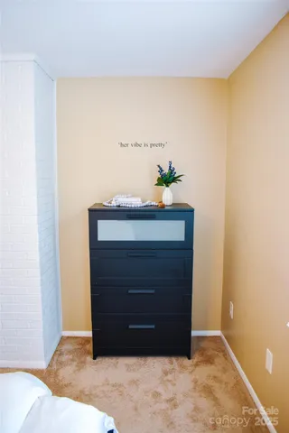 a room with a dresser