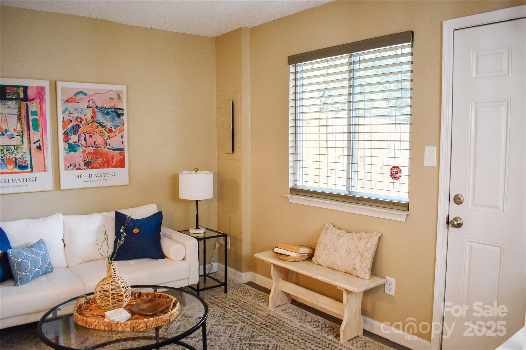 7526 Holly Grove Court Charlotte, NC 28227 - Photo 25 of 42 a living room with furniture and a window