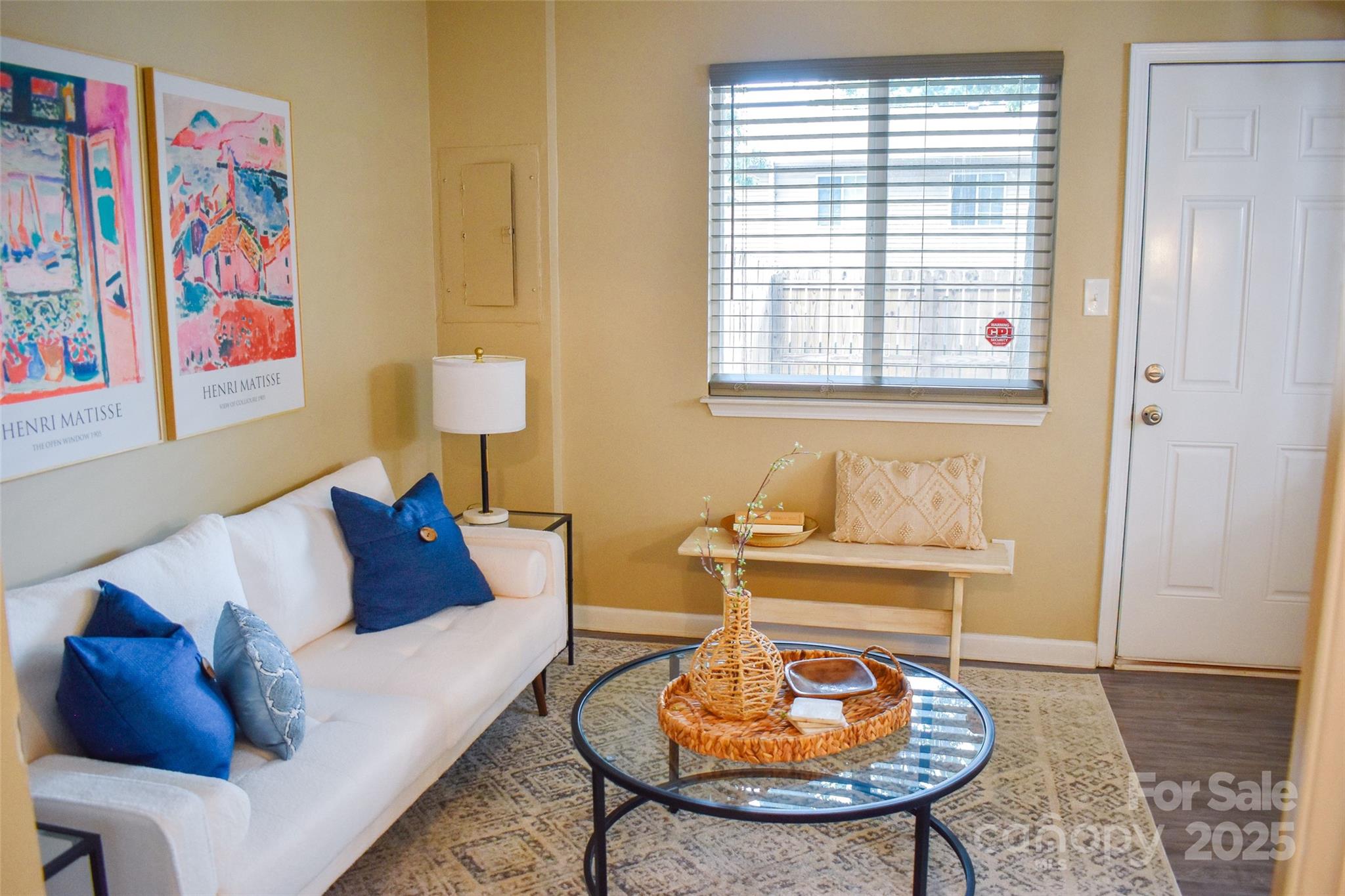 7526 Holly Grove Court Charlotte, NC 28227 - Photo 27 of 42 a living room with furniture and a window