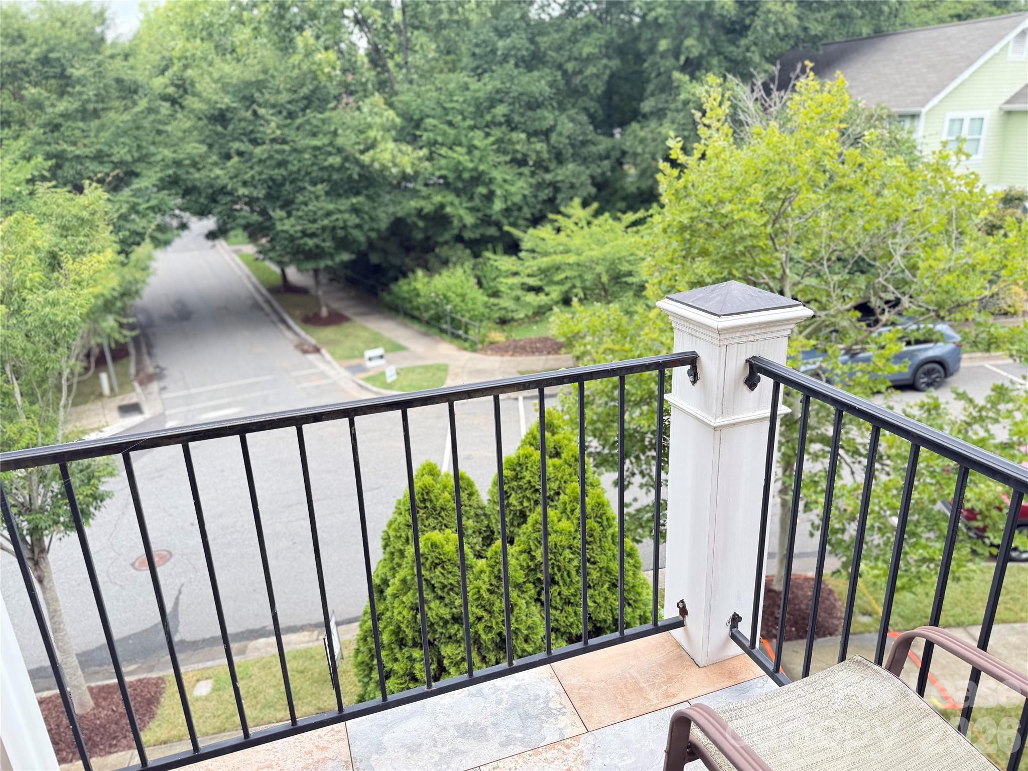 421 Spring Street Davidson, NC 28036 - Photo 9 of 24 a view of a balcony with wooden floor