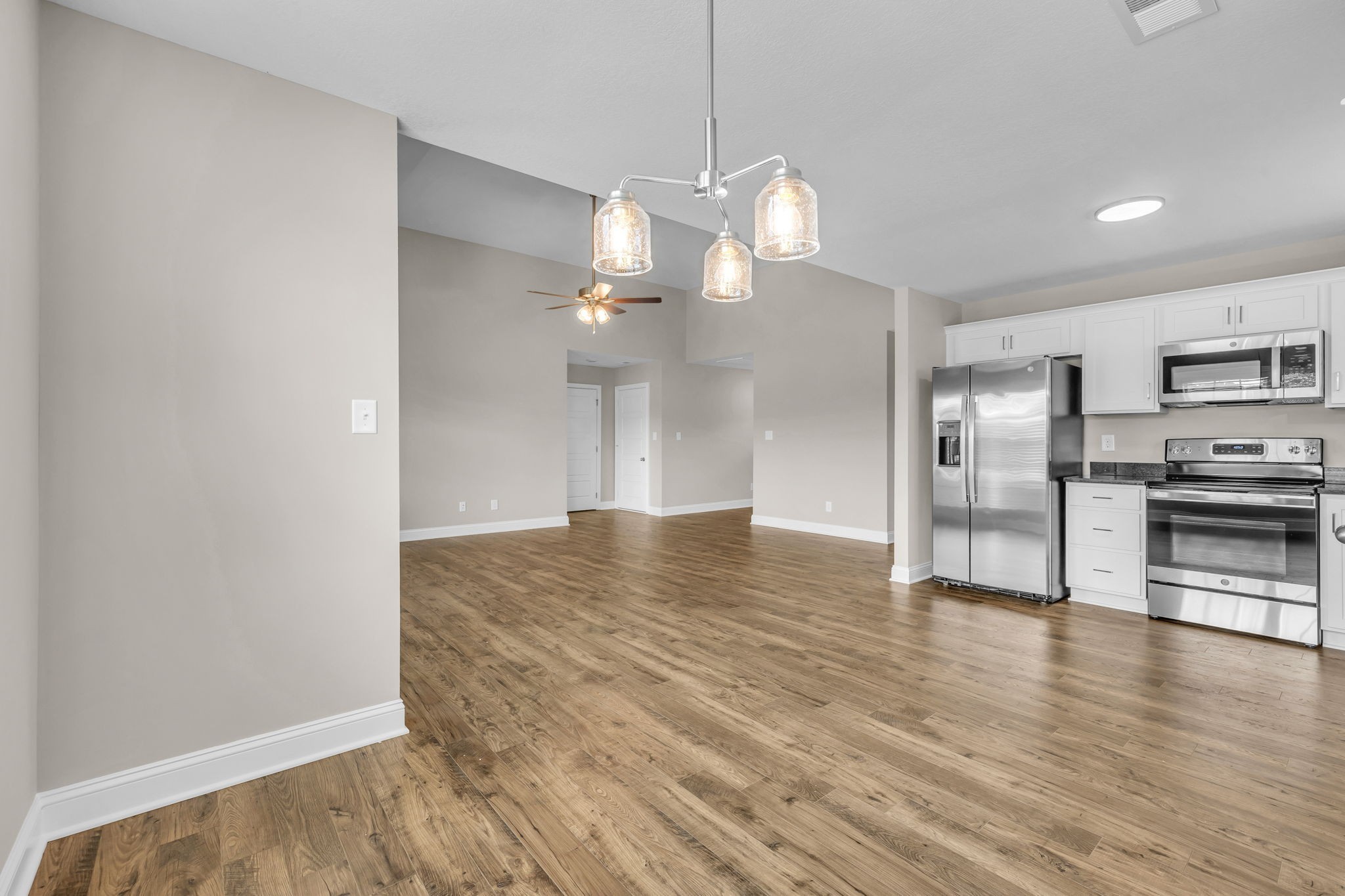 631 Avondale Road Oak Grove, KY 42262 - Photo 11 of 48 a view of a kitchen with a stove cabinets and wooden floor